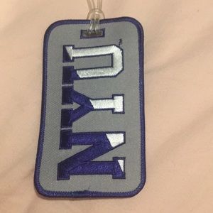 NYU luggage tag